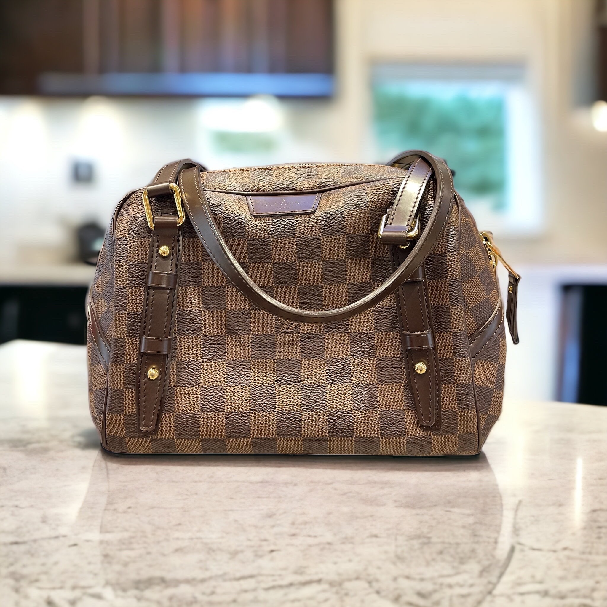 Louis Vuitton Rivington Handbag