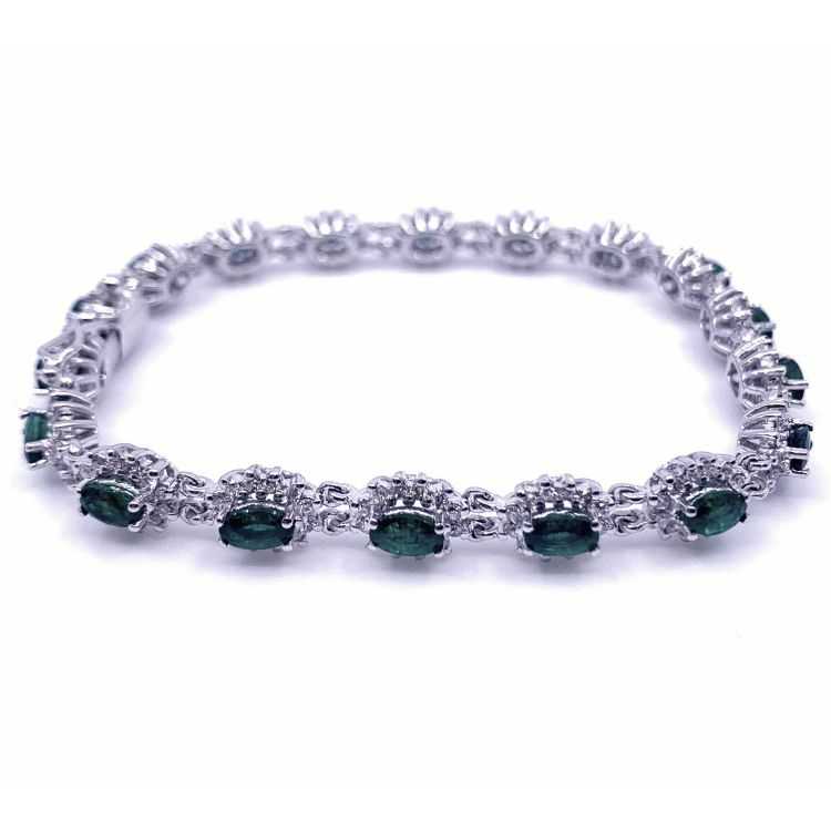 bracelet 18k  diamants/émeraudes