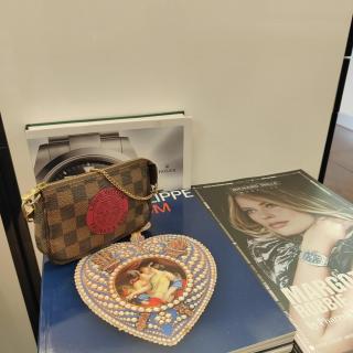 Sac Louis Vuitton Mini Pochette Eva