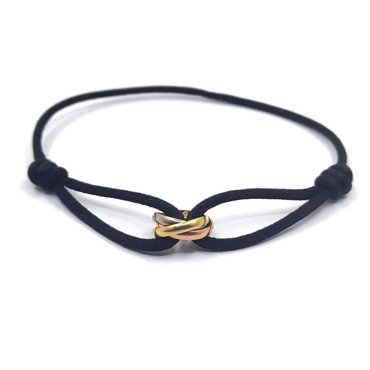Bracelet Cartier Trinity sur cordon
