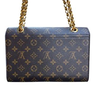 Sac Louis Vuitton Victoire Monogram et cuir Rouge
